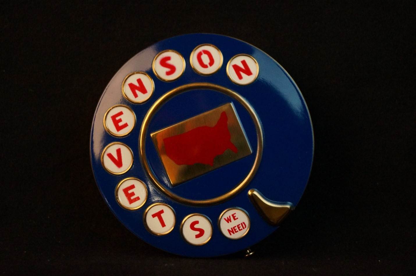 This Stevenson make-up compact in the style of a rotary telephone shows that while distrustful of campaign marketing, Stevens