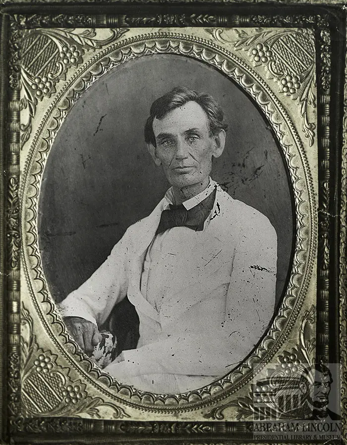 A photo of Abraham Lincoln wearing a white jacket
