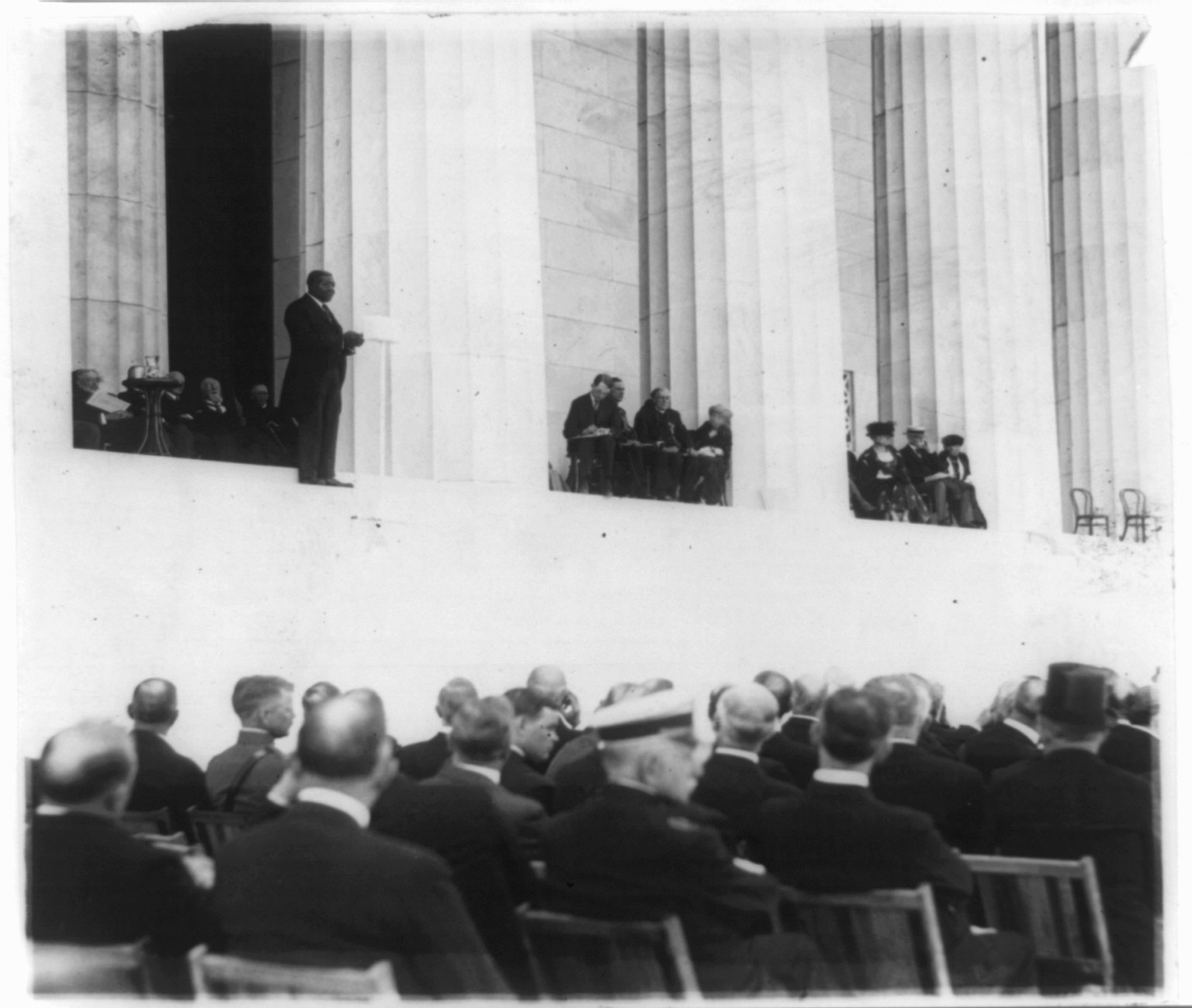 Photo of Robert Moton speaking on the steps of the Lincoln Memorial