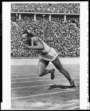 Jesse Owens mid race at the 1936 Berlin Olympics (DocsTeach 1936).