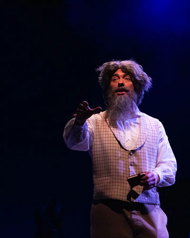 A photo of an actor portraying poet Walt Whitman