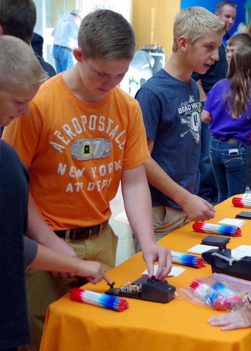 Students experimenting with civil war tech equipent