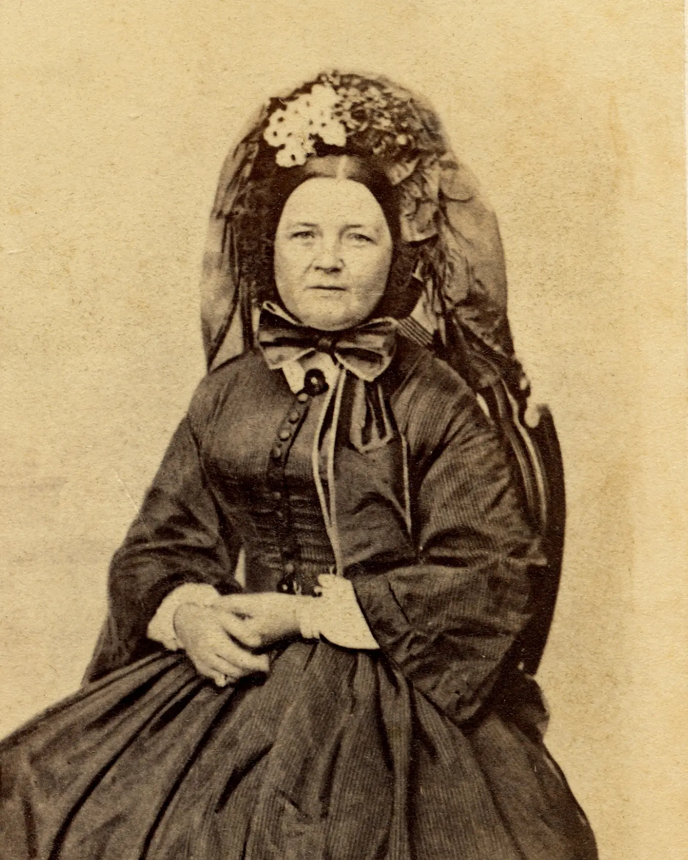 Photo of Mary Lincoln wearing a black bonnet and dress